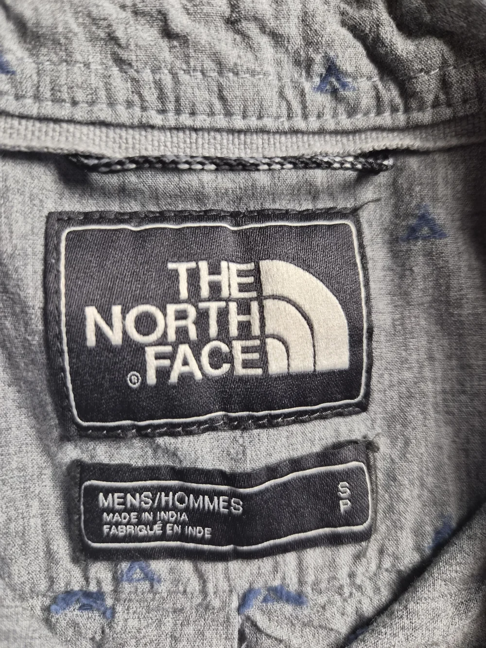 The North Face Light Gray Short Sleeve Button-Down Shirt with Subtle Print
